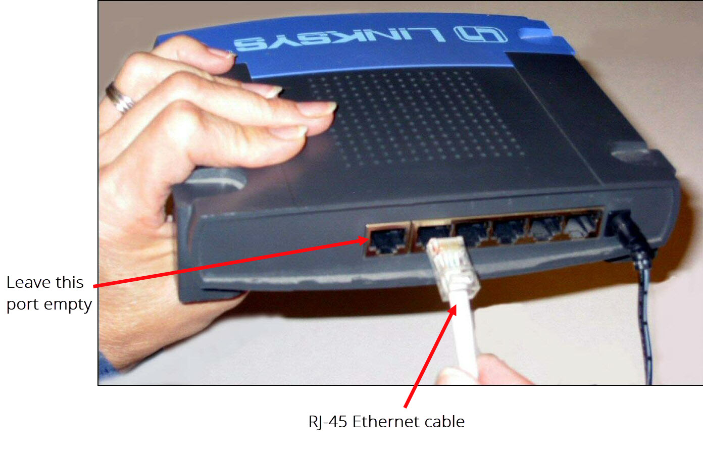 Ethernet cable connected to the back of the router for the Nomad